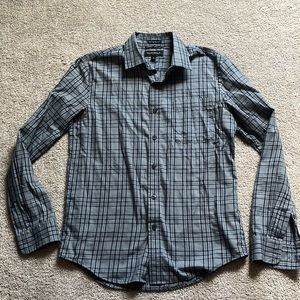 Dark gray with navy blue lines through it untuck it long sleeve shirt!